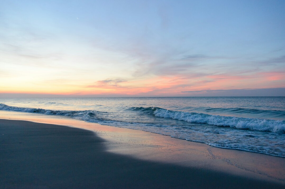 ocean waves at dusk